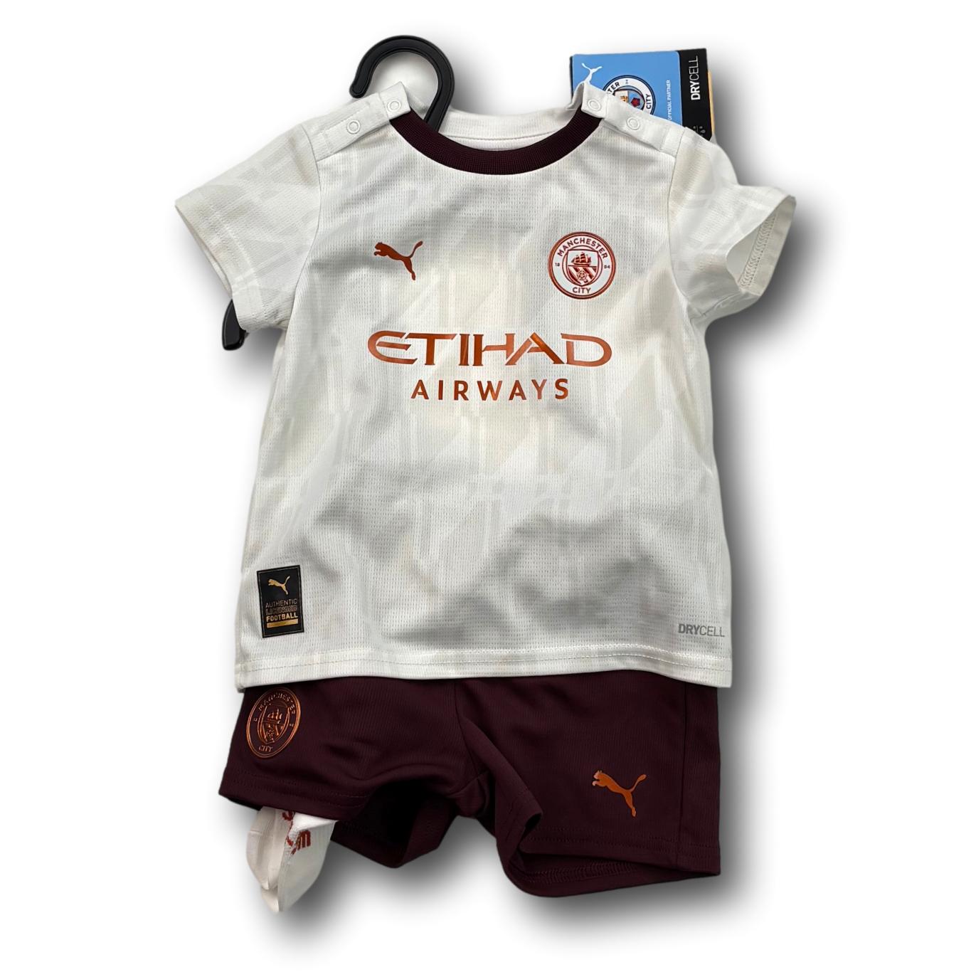 Manchester City Minikit - 2023-24 - Auswärts - 9-12 Monate - Nike